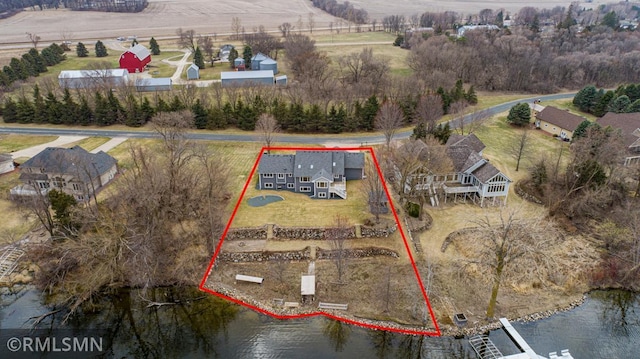 drone / aerial view with a rural view and a water view
