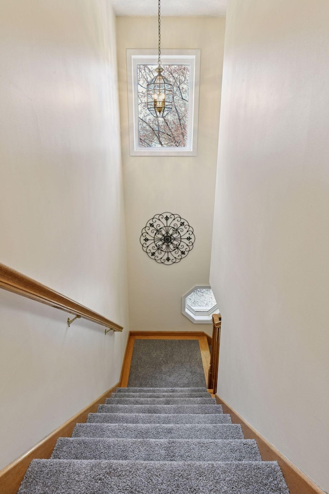 staircase with baseboards
