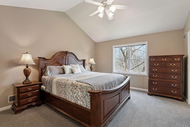 bedroom with visible vents, carpet flooring, vaulted ceiling, and baseboards
