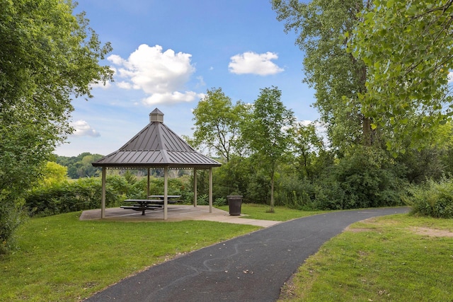view of home's community with a gazebo and a lawn