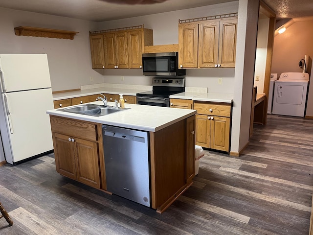130 2nd St NE, Mcintosh, MN 56556 - kitchen featuring a sink, light countertops, separate washer and dryer, dark wood finished floors, and stainless steel appliances