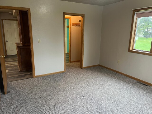 130 2nd St NE, Mcintosh, MN 56556 - empty room with carpet flooring, baseboards, and visible vents