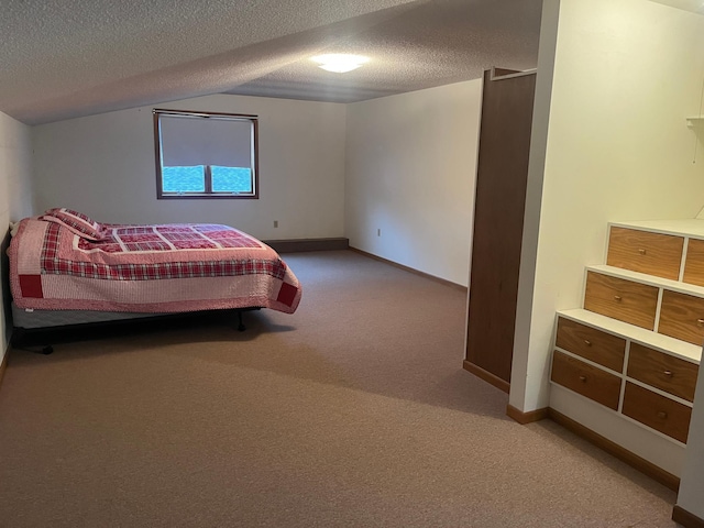 130 2nd St NE, Mcintosh, MN 56556 - bedroom with a textured ceiling, light colored carpet, and baseboards