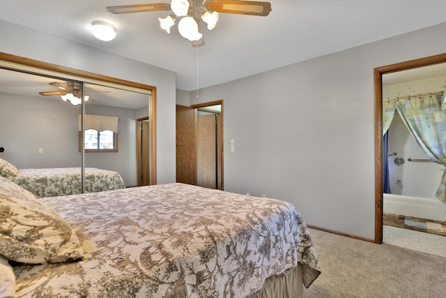 bedroom with carpet flooring, a closet, and a ceiling fan
