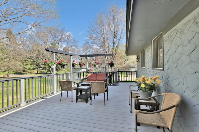 wooden terrace with a yard