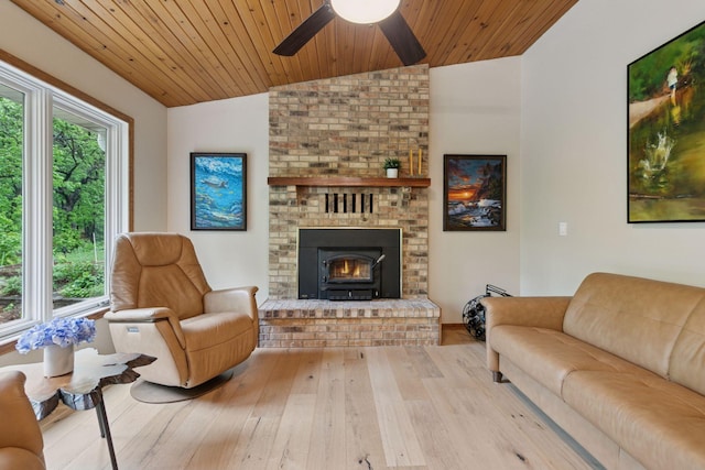 3861 Westbury Dr, Eagan, MN 55123 - living room featuring lofted ceiling, wood finished floors, a ceiling fan, a brick fireplace, and wood ceiling