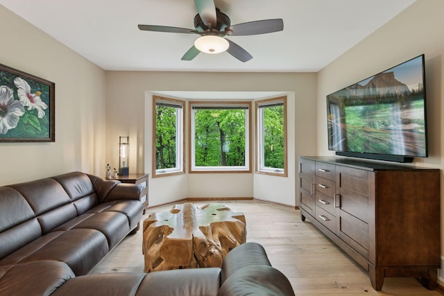 3861 Westbury Dr, Eagan, MN 55123 - living area featuring light wood-style floors, a ceiling fan, and baseboards
