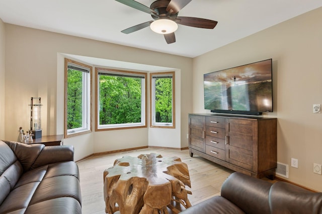 3861 Westbury Dr, Eagan, MN 55123 - living area featuring light wood-style flooring, a ceiling fan, and baseboards