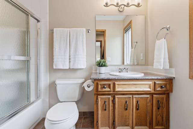 3861 Westbury Dr, Eagan, MN 55123 - full bathroom featuring vanity, toilet, shower / bath combination with glass door, and tile patterned flooring