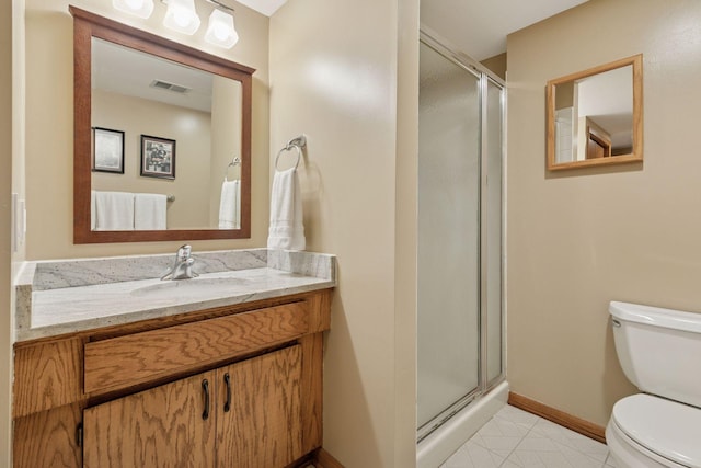 3861 Westbury Dr, Eagan, MN 55123 - bathroom featuring toilet, a shower stall, vanity, and baseboards