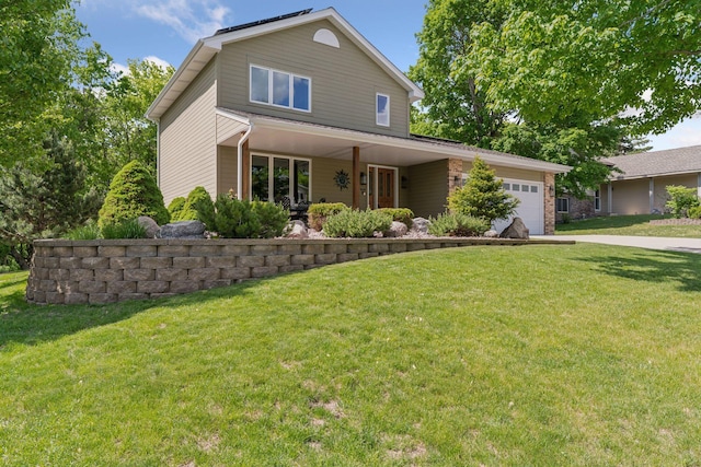3861 Westbury Dr, Eagan, MN 55123 - traditional-style house with a garage, a front lawn, and concrete driveway