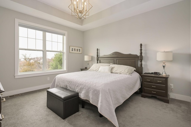 bedroom featuring carpet floors, baseboards, a chandelier, and visible vents