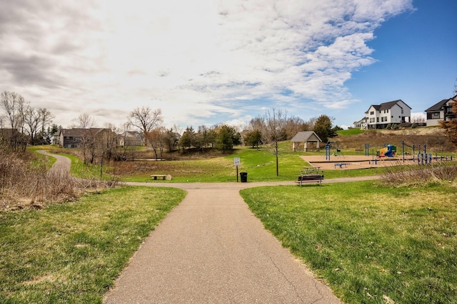 surrounding community featuring a gazebo and a lawn