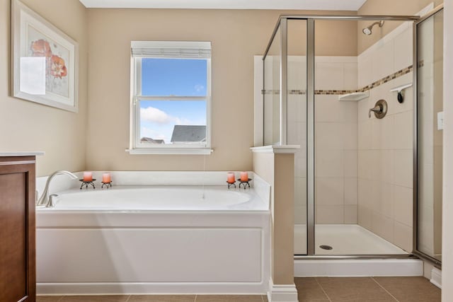 231 Prairie Way N, Bayport, MN 55003 - full bathroom with a garden tub, tile patterned floors, and a stall shower