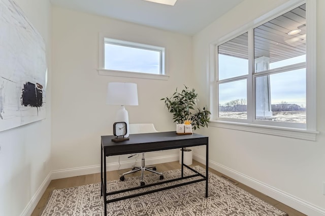 4501 Overlook Dr, Bloomington, MN 55437 - office space featuring plenty of natural light, baseboards, wood finished floors, and visible vents