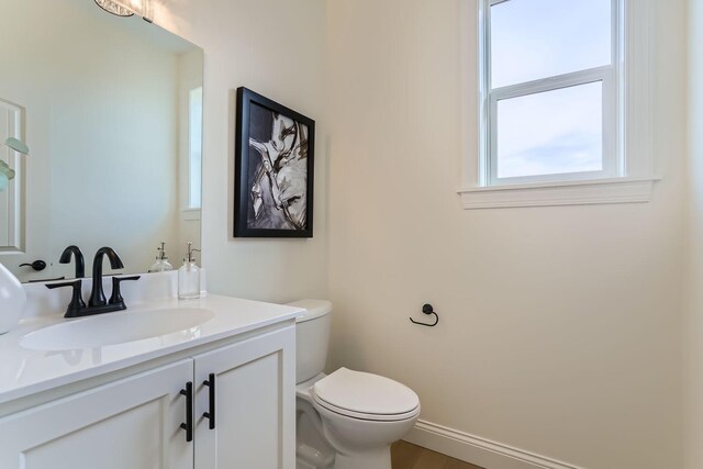 4501 Overlook Dr, Bloomington, MN 55437 - half bathroom featuring vanity and toilet