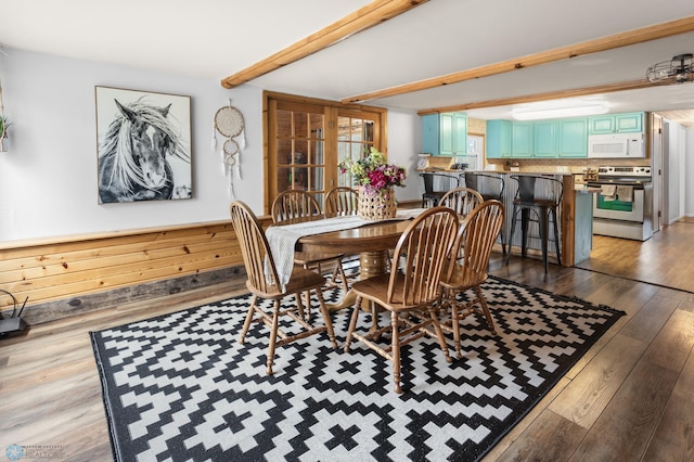 dining room with wood finished floors