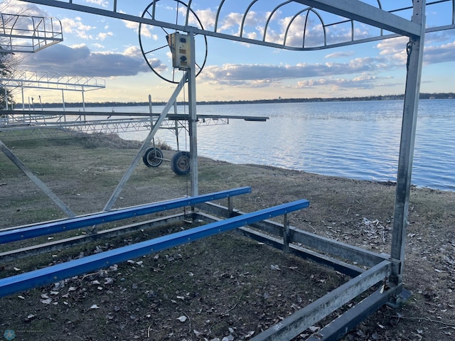 dock area with a water view