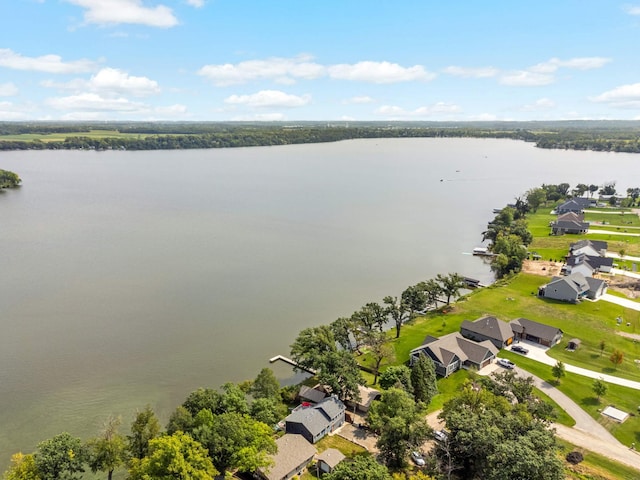 bird's eye view with a residential view and a water view
