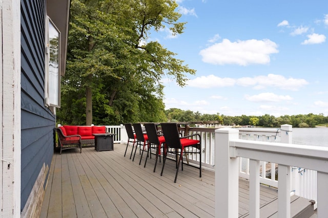 wooden deck featuring an outdoor living space