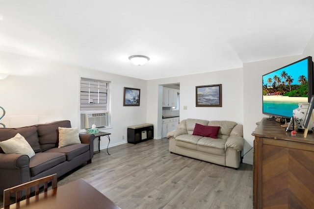 451 Taylor St NE, Minneapolis, MN 55413 - living area with cooling unit and light wood-style floors