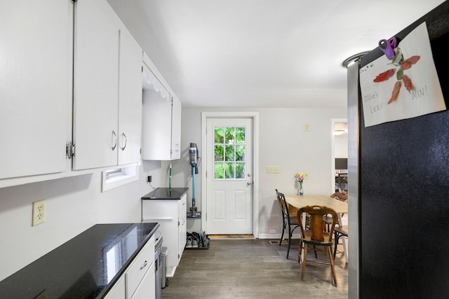 451 Taylor St NE, Minneapolis, MN 55413 - kitchen with wood finished floors and white cabinets