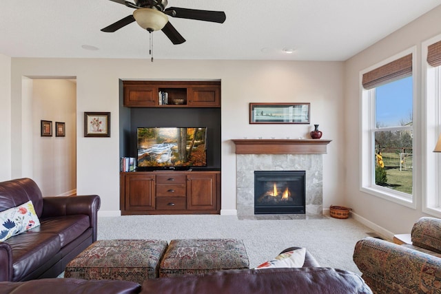 3626 Springwood Ct, Eagan, MN 55123 - carpeted living area featuring baseboards, a fireplace, and ceiling fan