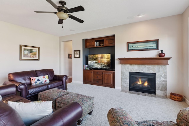 3626 Springwood Ct, Eagan, MN 55123 - living room featuring carpet, a tiled fireplace, a ceiling fan, and baseboards