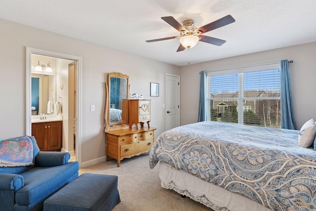 3626 Springwood Ct, Eagan, MN 55123 - bedroom with light colored carpet, ensuite bath, a ceiling fan, baseboards, and a sink