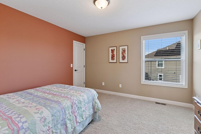 3626 Springwood Ct, Eagan, MN 55123 - bedroom featuring light colored carpet, baseboards, and a textured ceiling