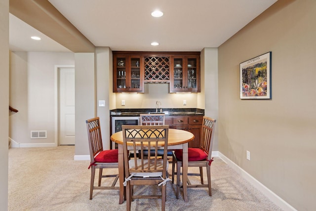 3626 Springwood Ct, Eagan, MN 55123 - dining room with wet bar, recessed lighting, light carpet, and baseboards