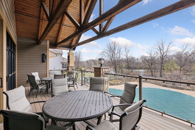 3626 Springwood Ct, Eagan, MN 55123 - wooden deck featuring outdoor dining space, a fenced backyard, and a water view