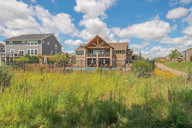3626 Springwood Ct, Eagan, MN 55123 - back of house featuring a balcony