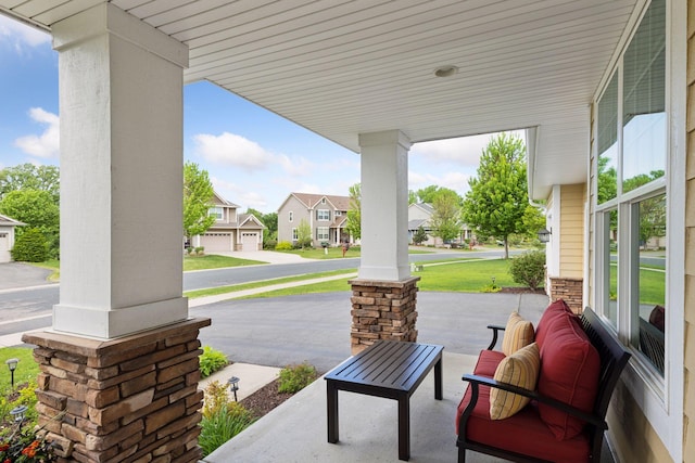 3626 Springwood Ct, Eagan, MN 55123 - covered porch featuring a residential view