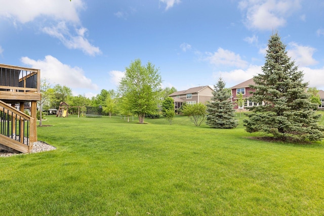 3626 Springwood Ct, Eagan, MN 55123 - view of green lawn featuring a playground and a deck