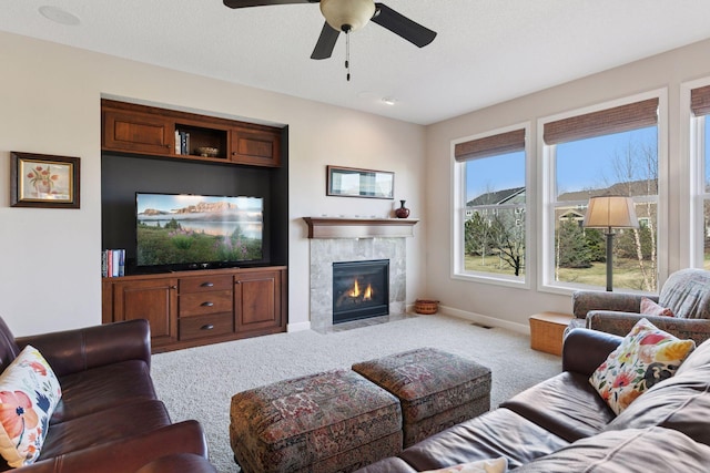 3626 Springwood Ct, Eagan, MN 55123 - carpeted living room featuring ceiling fan, a fireplace, and baseboards