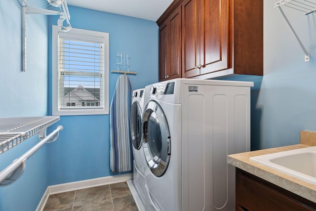 3626 Springwood Ct, Eagan, MN 55123 - washroom with cabinet space, washing machine and clothes dryer, and baseboards