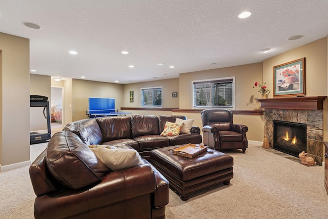 3626 Springwood Ct, Eagan, MN 55123 - carpeted living room with recessed lighting, a fireplace, a textured ceiling, and baseboards