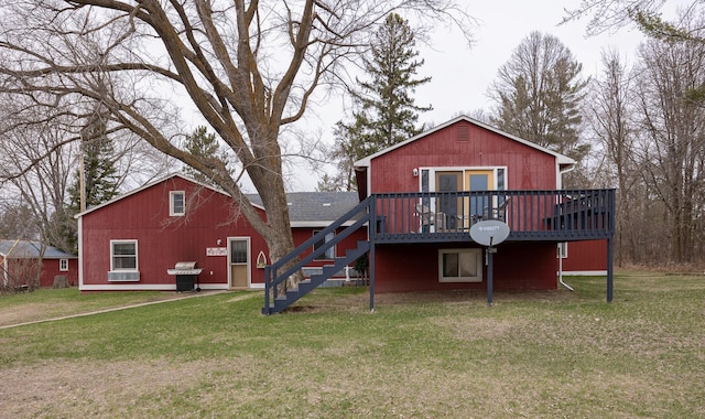 2475 44th St SW, Pine River, MN 56474 - rear view of property with stairway, a wooden deck, and a lawn