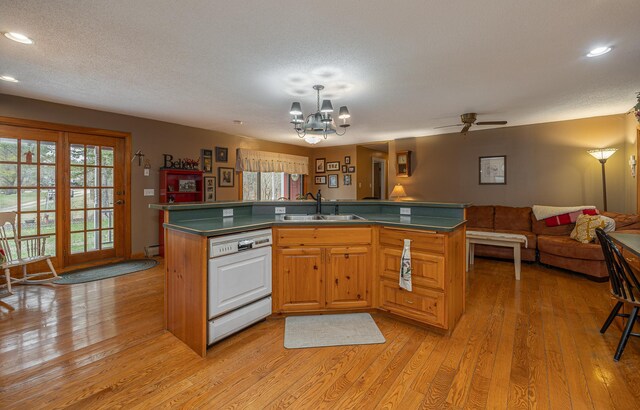 2475 44th St SW, Pine River, MN 56474 - kitchen with white dishwasher, a healthy amount of sunlight, open floor plan, and a sink