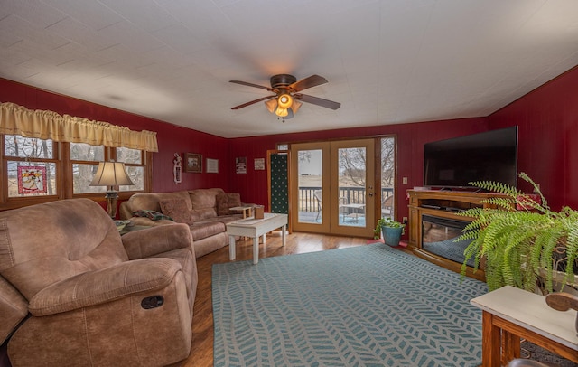 2475 44th St SW, Pine River, MN 56474 - living room with wood finished floors, a ceiling fan, and french doors
