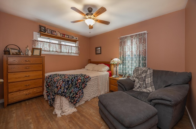 2475 44th St SW, Pine River, MN 56474 - bedroom featuring hardwood / wood-style floors and a ceiling fan