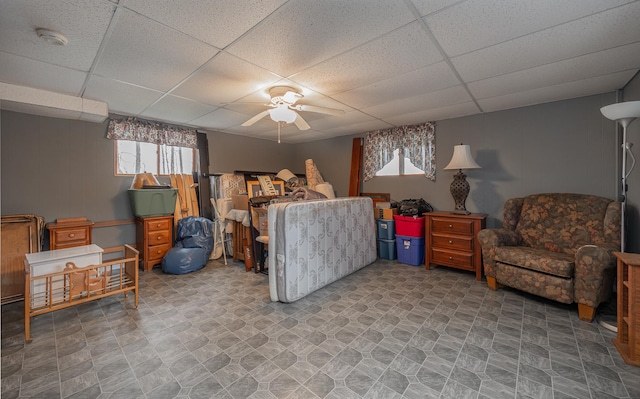 2475 44th St SW, Pine River, MN 56474 - bedroom with a paneled ceiling, a ceiling fan, and stone finish flooring