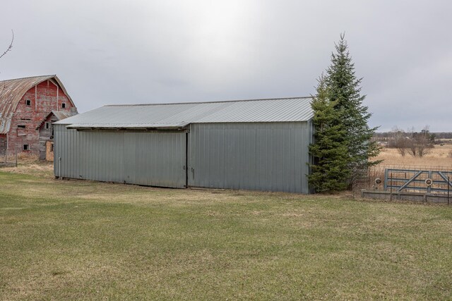 2475 44th St SW, Pine River, MN 56474 - view of outdoor structure with fence and an outdoor structure