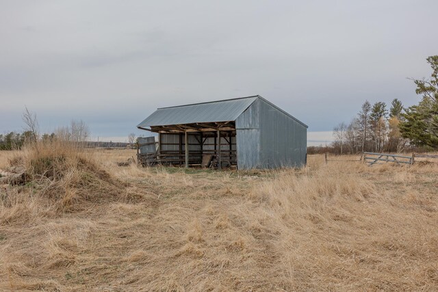 2475 44th St SW, Pine River, MN 56474 - view of pole building with a rural view