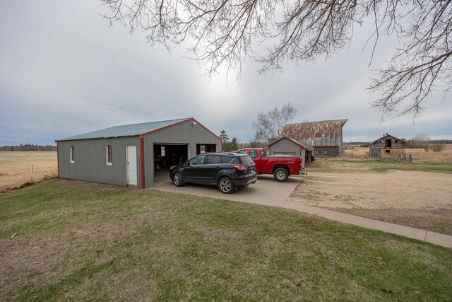 2475 44th St SW, Pine River, MN 56474 - exterior space with a detached garage and concrete driveway