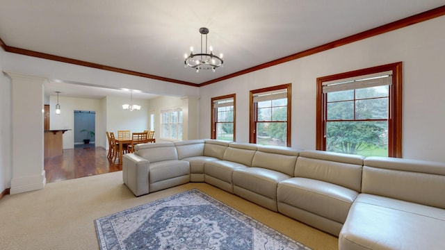 1213 Grey Fox Ave SW, Rochester, MN 55902 - carpeted living area featuring a chandelier, ornamental molding, and baseboards