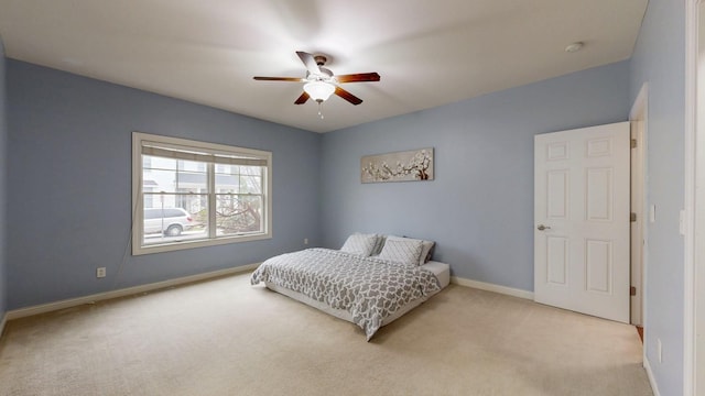 1213 Grey Fox Ave SW, Rochester, MN 55902 - bedroom featuring carpet, baseboards, and ceiling fan