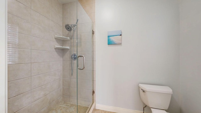 1213 Grey Fox Ave SW, Rochester, MN 55902 - bathroom with a shower stall, toilet, and baseboards