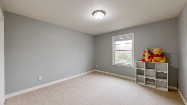 1213 Grey Fox Ave SW, Rochester, MN 55902 - unfurnished room featuring carpet floors and baseboards